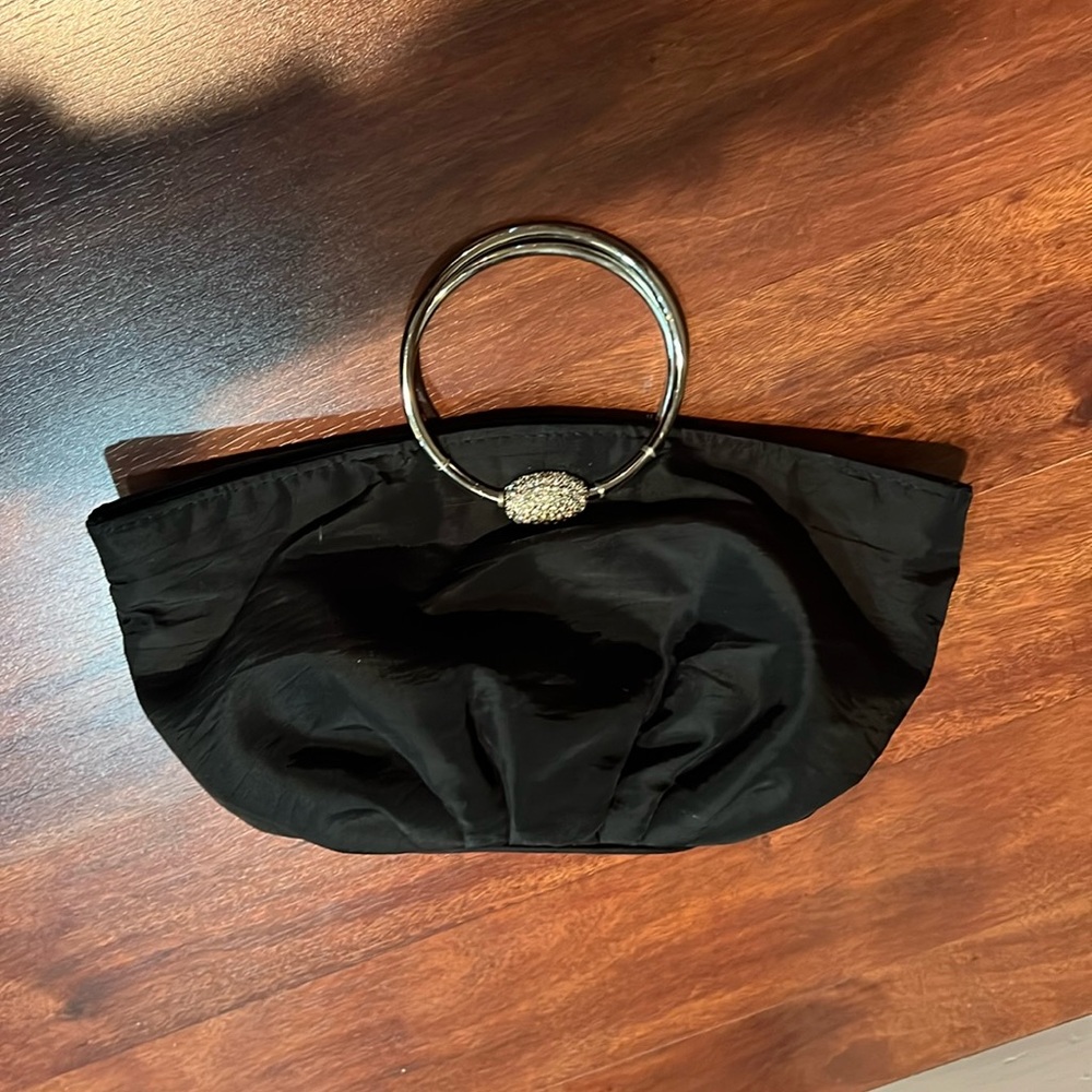 black and silver small hand clutch